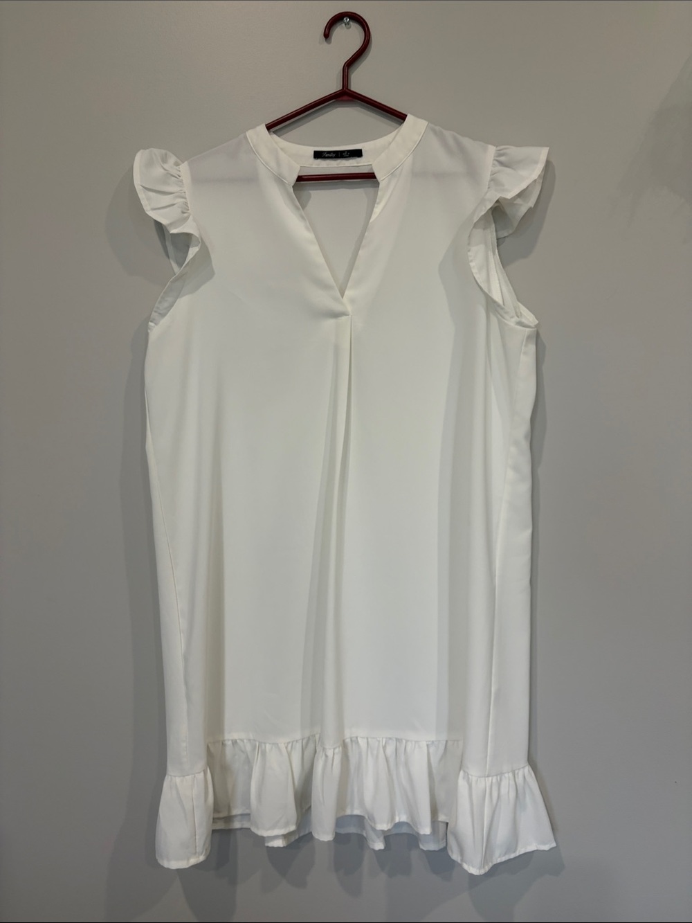 Elegant White Ruffle-Hem Sleeveless Dress